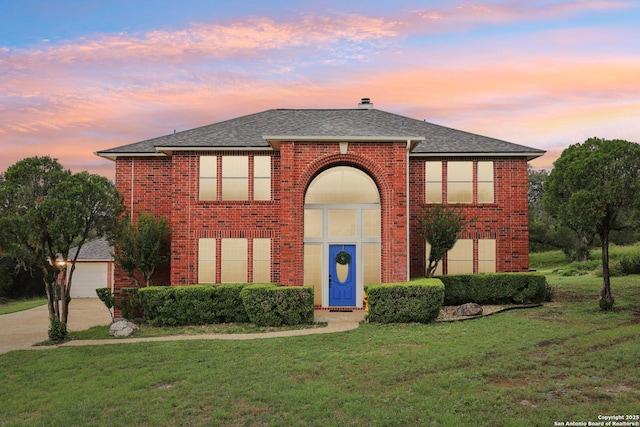 23613 Grayling Ln, San Antonio, TX 78259 - traditional home with a front lawn, roof with shingles, brick siding, a garage, and a chimney
