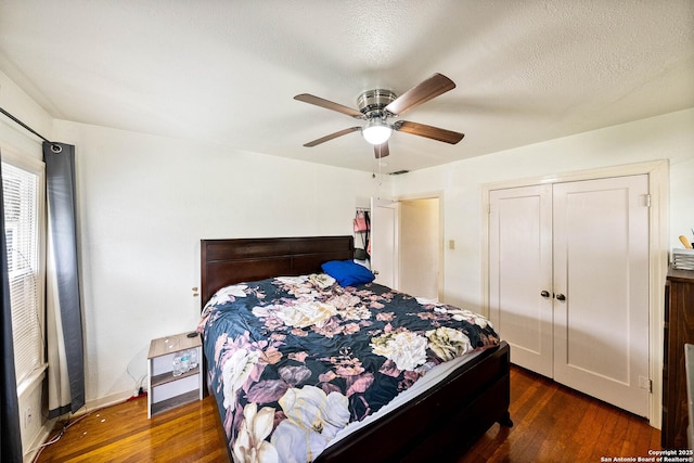 702 John Adams, San Antonio, TX 78228 - bedroom with wood finished floors, a closet, and a ceiling fan