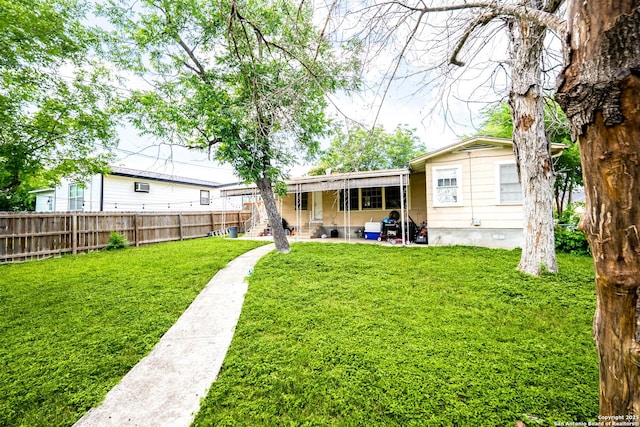 702 John Adams, San Antonio, TX 78228 - rear view of house featuring a fenced backyard, a patio area, and crawl space