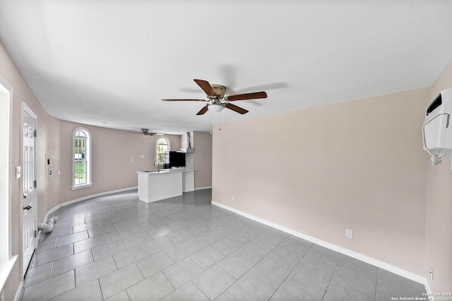 702 John Adams, San Antonio, TX 78228 - unfurnished living room with ceiling fan and tile patterned flooring