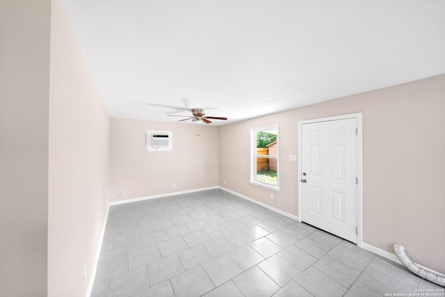 702 John Adams, San Antonio, TX 78228 - tiled empty room with a ceiling fan and a wall mounted AC
