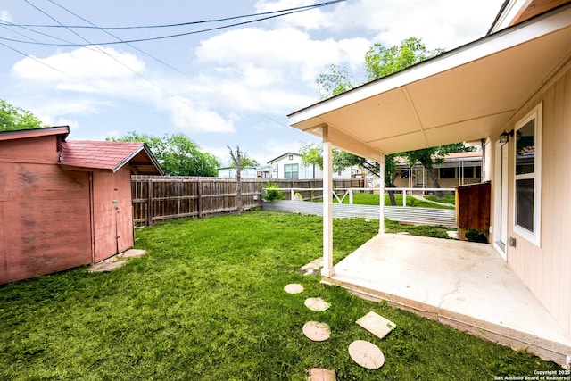 702 John Adams, San Antonio, TX 78228 - fenced backyard featuring a patio