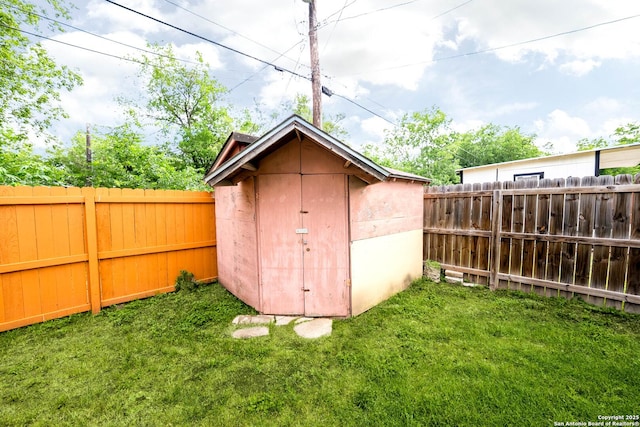 702 John Adams, San Antonio, TX 78228 - view of shed featuring a fenced backyard