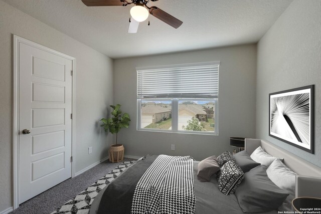12810 Olson Pt, San Antonio, TX 78252 - carpeted bedroom with a ceiling fan and baseboards