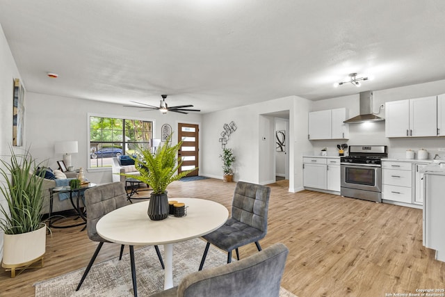 4426 Newcome, San Antonio, TX 78229 - dining area with light wood-style floors and a ceiling fan