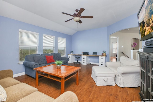 4922 Augusta, San Antonio, TX 78247 - living room with arched walkways, ceiling fan, wood finished floors, an office area, and vaulted ceiling