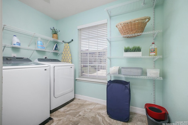 4922 Augusta, San Antonio, TX 78247 - laundry area featuring washer and dryer and baseboards