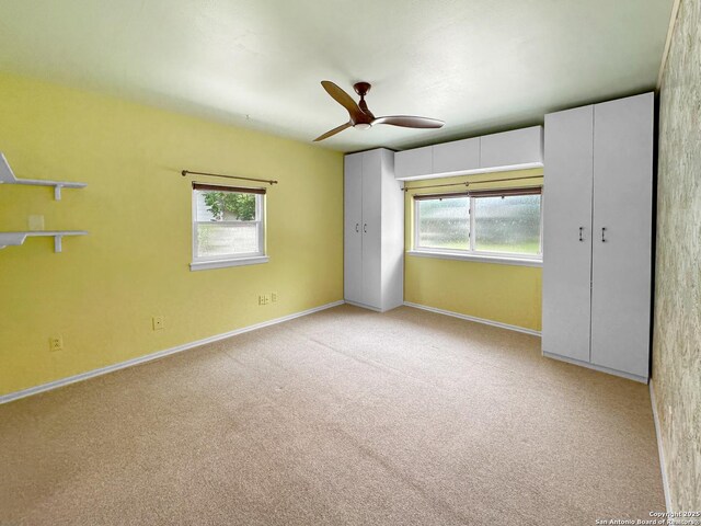 737 N Central, New Braunfels, TX 78130 - unfurnished bedroom with carpet and ceiling fan