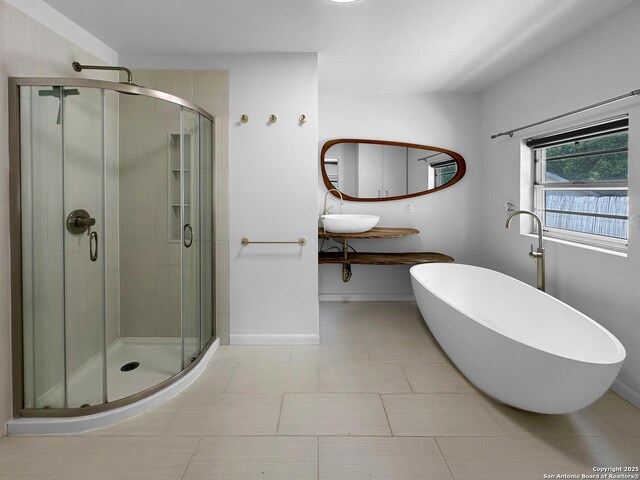 737 N Central, New Braunfels, TX 78130 - full bath with a stall shower, a freestanding bath, and vanity
