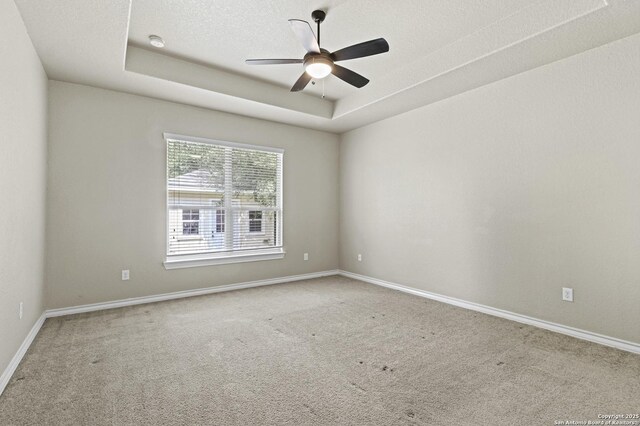 8503 Kallison Arbor, San Antonio, TX 78254 - carpeted empty room featuring ceiling fan, a smoke detector, and a raised ceiling