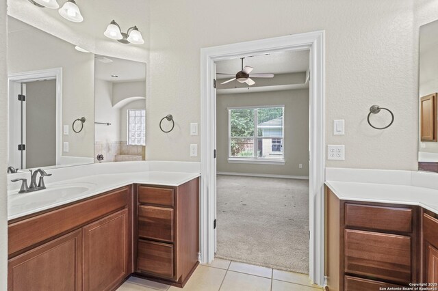 8503 Kallison Arbor, San Antonio, TX 78254 - bathroom with ceiling fan, vanity, and tile patterned floors