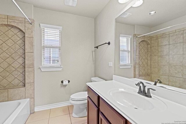 8503 Kallison Arbor, San Antonio, TX 78254 - bathroom featuring plenty of natural light, tile patterned flooring, vanity, and bathtub / shower combination
