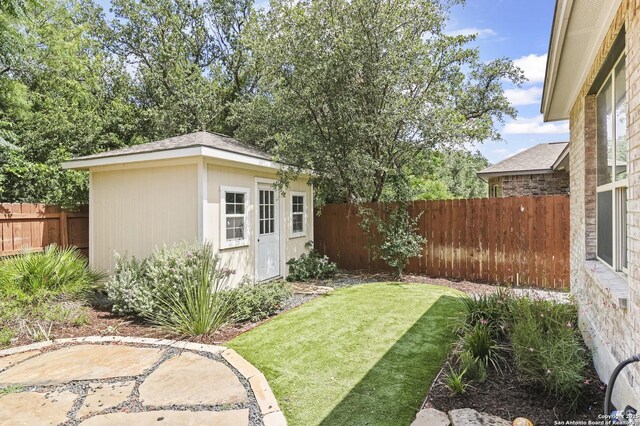 8503 Kallison Arbor, San Antonio, TX 78254 - fenced backyard with a storage unit