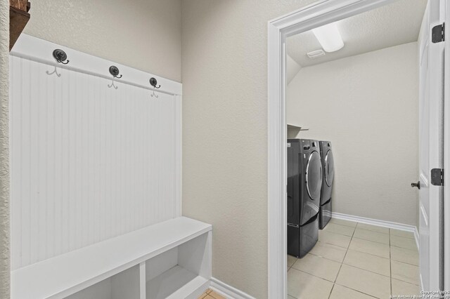 8503 Kallison Arbor, San Antonio, TX 78254 - laundry area with washer and clothes dryer and light tile patterned floors