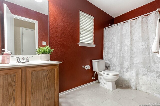 16102 Barrell Run, San Antonio, TX 78247 - full bathroom featuring vanity, tile patterned flooring, a textured wall, and curtained shower