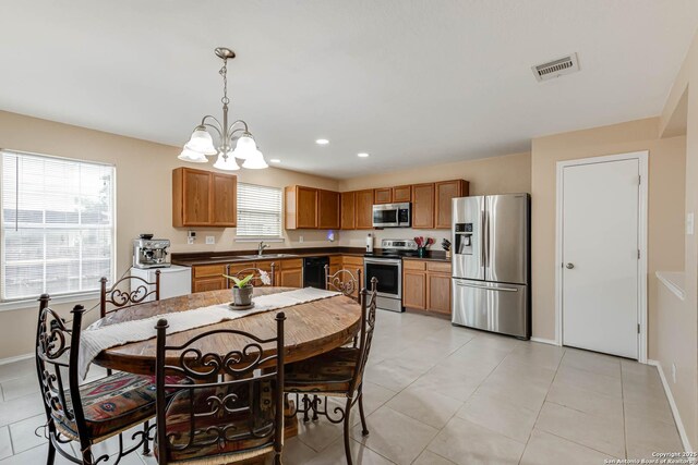 16102 Barrell Run, San Antonio, TX 78247 - dining area with a chandelier, recessed lighting, and light tile patterned floors