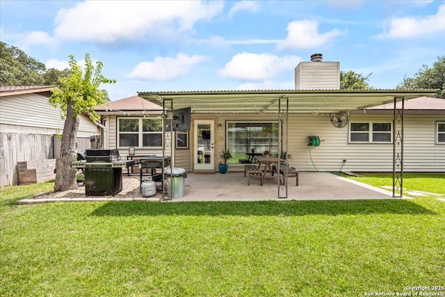 3527 Oakhorne St, San Antonio, TX 78247 - back of house featuring a patio and a chimney
