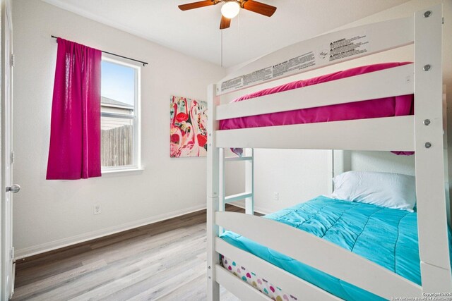 6123 Foster Ml, San Antonio, TX 78222 - bedroom with wood finished floors and ceiling fan