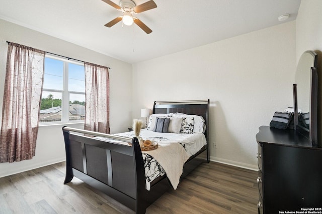 6123 Foster Ml, San Antonio, TX 78222 - bedroom with dark wood finished floors and a ceiling fan