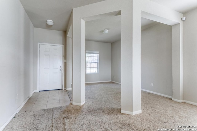 4310 Loring, Converse, TX 78109 - carpeted foyer featuring baseboards and tile patterned floors