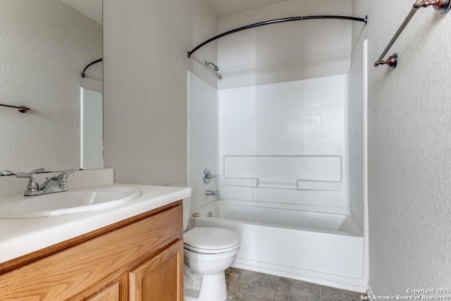 4310 Loring, Converse, TX 78109 - bathroom with vanity, a textured wall, and washtub / shower combination