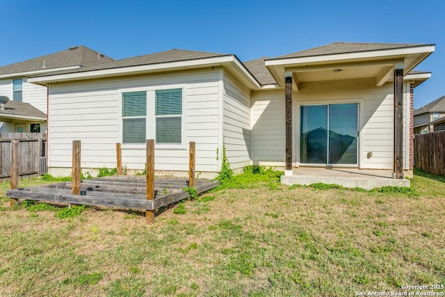 4310 Loring, Converse, TX 78109 - back of property with a fenced backyard, a patio, and a garden
