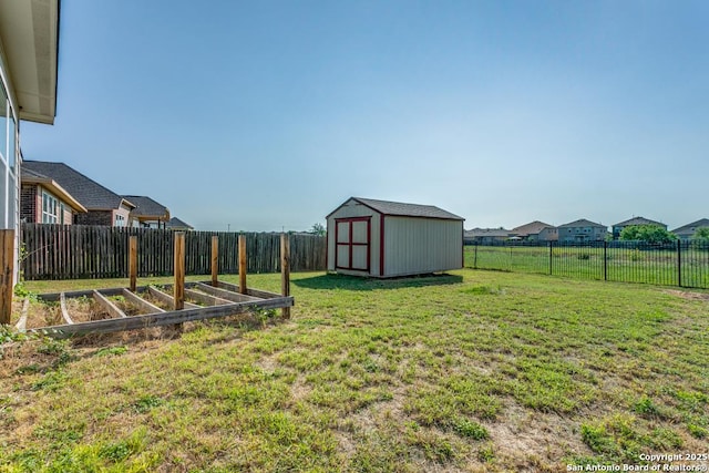 4310 Loring, Converse, TX 78109 - fenced backyard featuring a storage shed and a vegetable garden