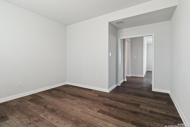 1619 Vista View Dr, Pleasanton, TX 78064 - empty room with dark wood-type flooring