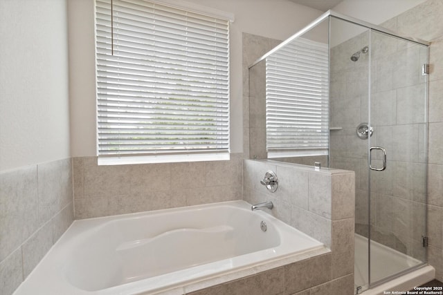 1619 Vista View Dr, Pleasanton, TX 78064 - bathroom featuring a bath and a stall shower