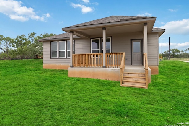 1619 Vista View Dr, Pleasanton, TX 78064 - back of house featuring a yard and a shingled roof