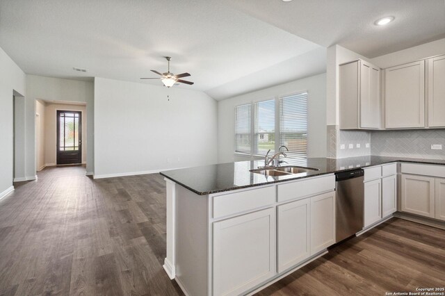 1619 Vista View Dr, Pleasanton, TX 78064 - kitchen with dishwasher, a peninsula, ceiling fan, dark wood finished floors, and recessed lighting