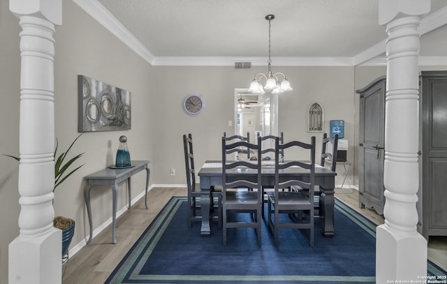 1819 Babcock Unit 605, San Antonio, TX 78229 - dining space featuring wood finished floors, decorative columns, ornamental molding, a textured ceiling, and ceiling fan