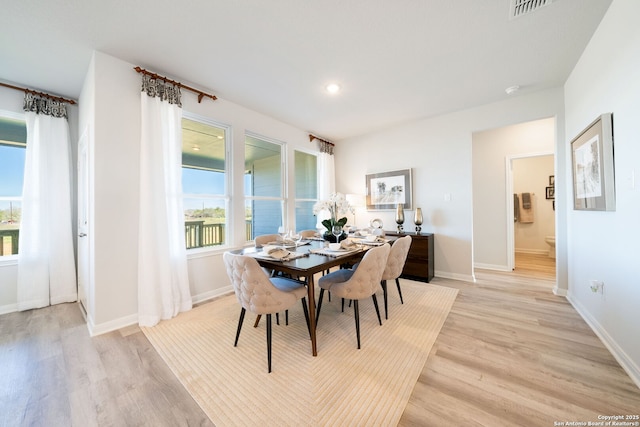 1562 Vista View Dr, Pleasanton, TX 78064 - dining area featuring light wood-style floors and recessed lighting