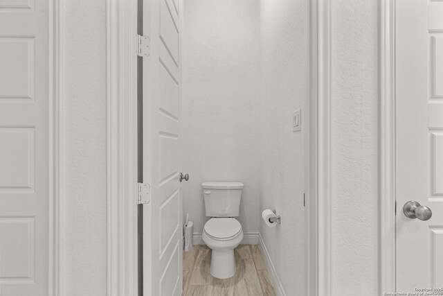 2604 Sueno Pt, San Antonio, TX 78245 - bathroom with toilet and baseboards