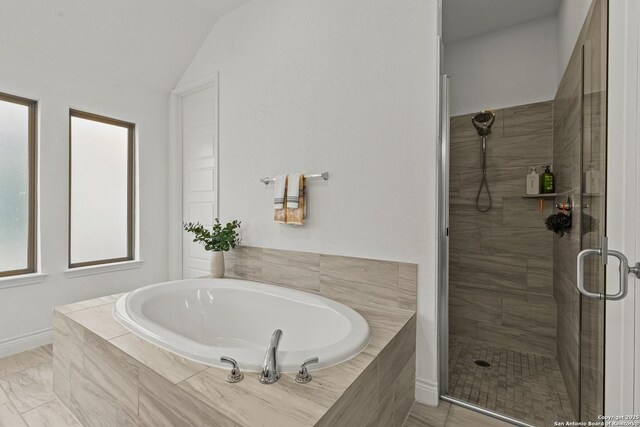 2604 Sueno Pt, San Antonio, TX 78245 - bathroom featuring a stall shower, a garden tub, and lofted ceiling