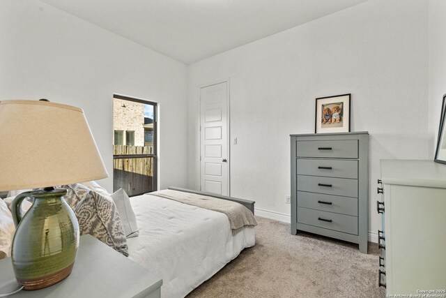 2604 Sueno Pt, San Antonio, TX 78245 - bedroom featuring light colored carpet and baseboards