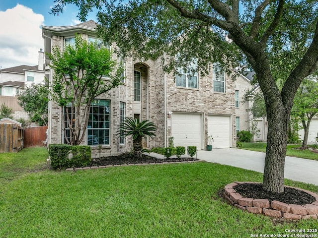 2115 Encino Breeze, San Antonio, TX 78259 - view of front facade with driveway, a garage, and brick siding