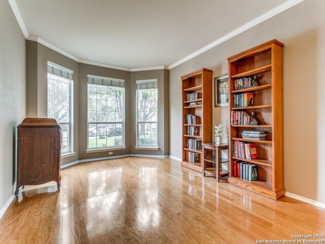 2115 Encino Breeze, San Antonio, TX 78259 - sitting room featuring wood finished floors and ornamental molding