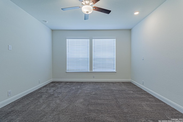12455 Diagon Aly, San Antonio, TX 78254 - unfurnished room featuring ceiling fan, dark colored carpet, and a smoke detector