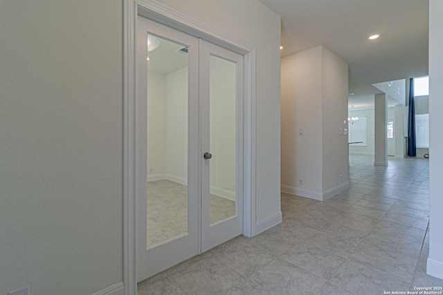 12455 Diagon Aly, San Antonio, TX 78254 - hallway featuring light tile patterned floors, french doors, and recessed lighting