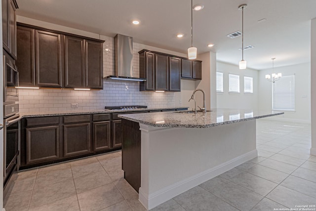 12455 Diagon Aly, San Antonio, TX 78254 - kitchen featuring wall chimney exhaust hood, light stone countertops, light tile patterned floors, backsplash, and dark brown cabinets