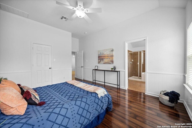 1219 Alpine Pond, San Antonio, TX 78260 - bedroom featuring wood finished floors, a wainscoted wall, connected bathroom, a ceiling fan, and lofted ceiling
