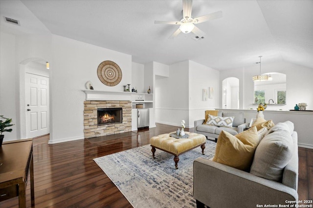 1219 Alpine Pond, San Antonio, TX 78260 - living area featuring arched walkways, wood finished floors, ceiling fan, lofted ceiling, and a stone fireplace