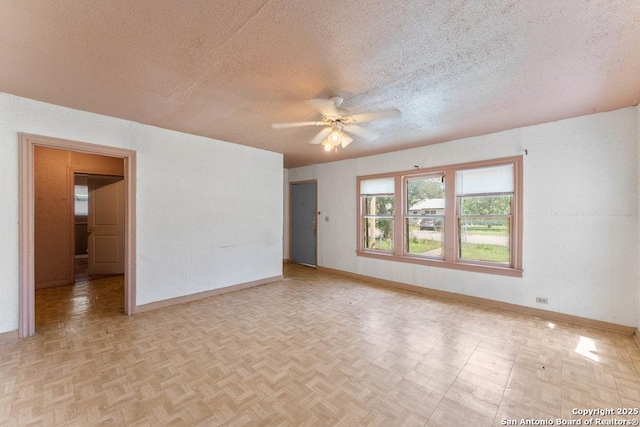 518 Wright Ave, Schertz, TX 78154 - spare room featuring a textured ceiling and a ceiling fan