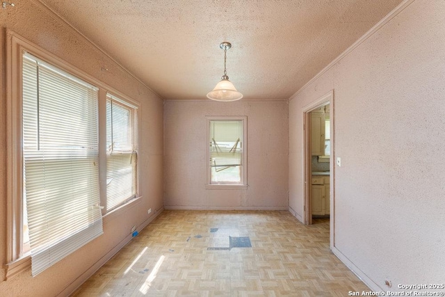 518 Wright Ave, Schertz, TX 78154 - empty room featuring a textured ceiling and ornamental molding