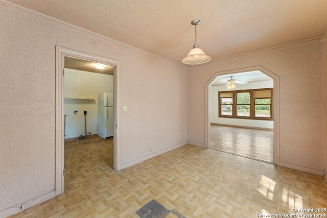 518 Wright Ave, Schertz, TX 78154 - empty room featuring ornamental molding, a textured ceiling, a ceiling fan, and a textured wall