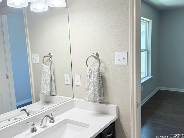 100 Lorenz Rd Unit 803, San Antonio, TX 78209 - bathroom with healthy amount of natural light, vanity, and wood finished floors