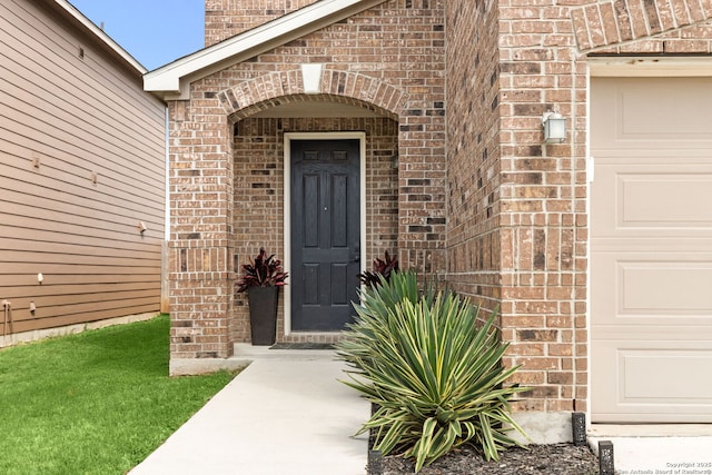 2059 Wind Chime, New Braunfels, TX 78130 - doorway to property featuring brick siding