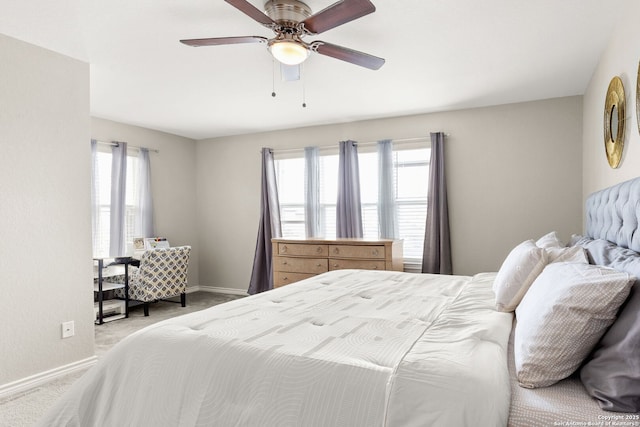 2059 Wind Chime, New Braunfels, TX 78130 - bedroom with multiple windows, light colored carpet, and ceiling fan