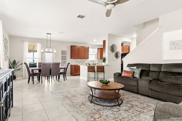 2059 Wind Chime, New Braunfels, TX 78130 - living room with a ceiling fan and light tile patterned floors